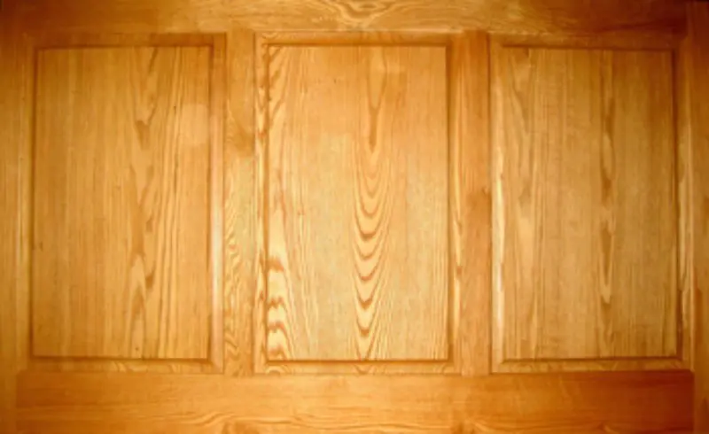 A close up of the wood grain on a door.