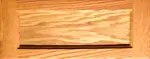 A wooden table with a long metal rod.