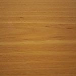 A close up of the wood grain on a table.