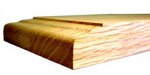 A close up of the edge of a wooden board