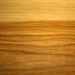 A close up of the wood grain on a table.