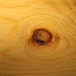 A close up of the wood grain on a wooden surface.