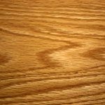 A close up of the wood grain on a floor.