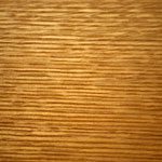 A close up of the wood grain on a surface.