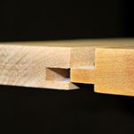 A close up of the wood joint in a piece of furniture.