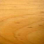 A close up of the wood grain on a table.