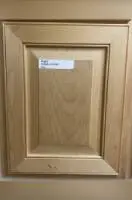 A close up of the door on a cabinet